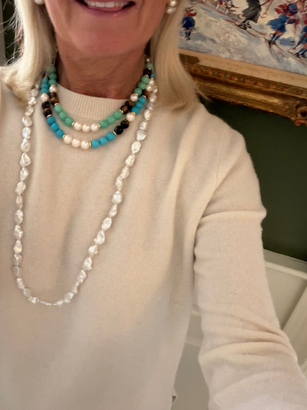 The Long Pearl Necklace