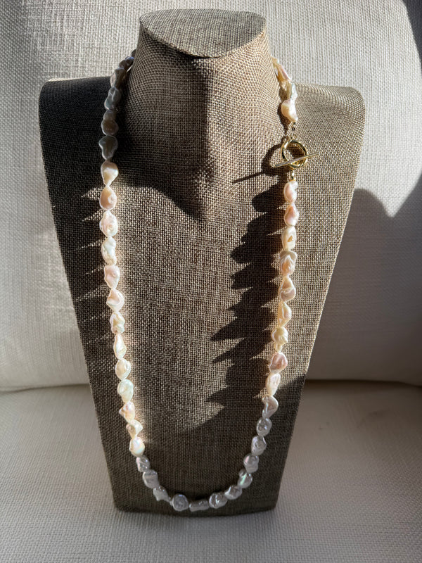 The Long Pearl Necklace