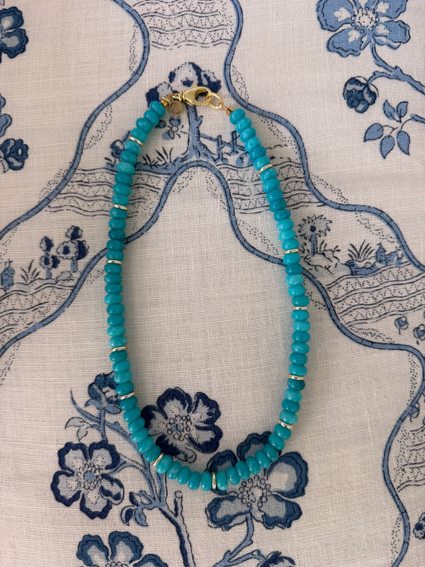 Turquoise and gold beaded necklace