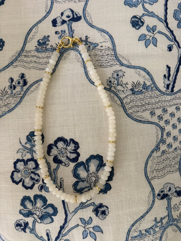White and gold beaded necklace