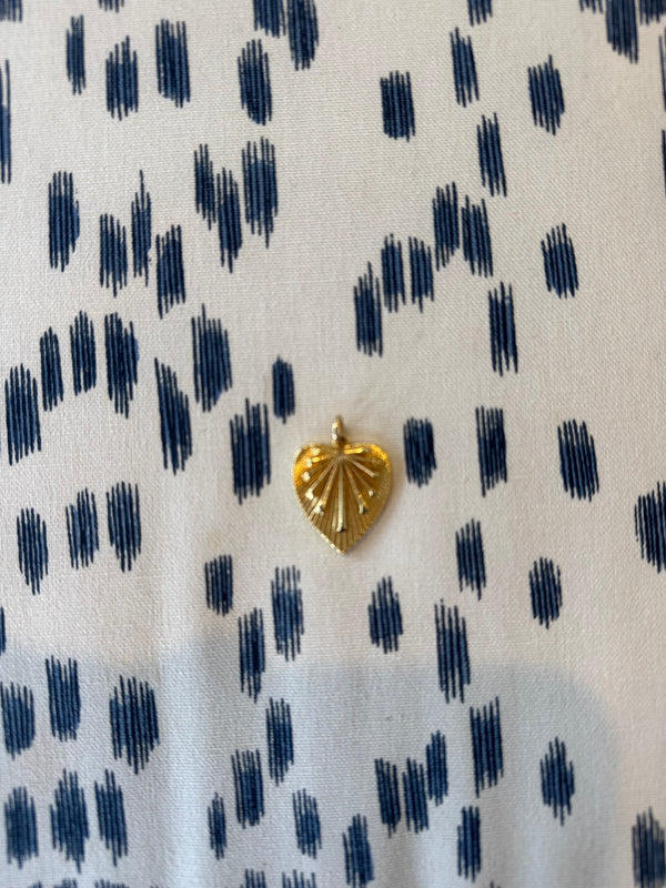 The Etched Bursting Heart Charm