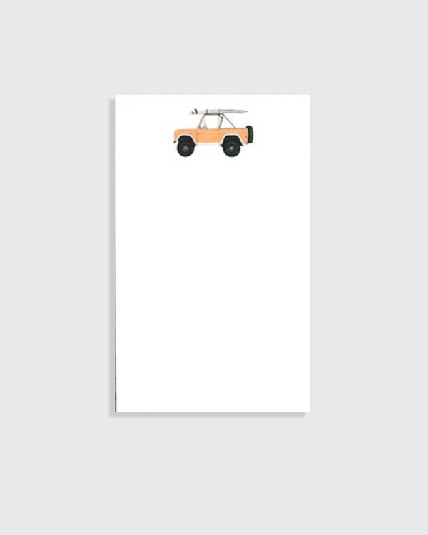 Orange bronco with surfboards SUV Notepad